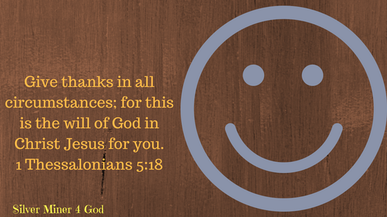 1 Thessalonians 5:18 verse with a smiley face on the graphic